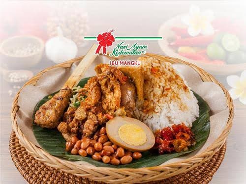 The chicken rice served in a woven basket, with the warung's logo