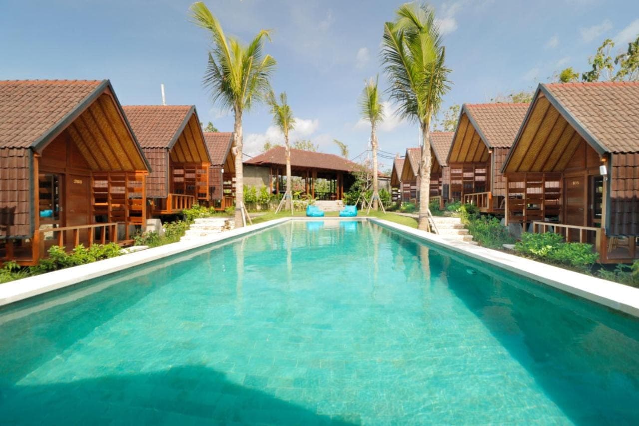 an image of a swimming pool at a resort at Bingin Lodge Uluwatu in Uluwatu