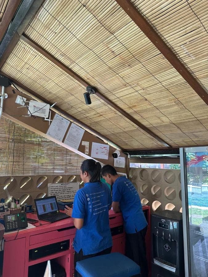 two people standing at a counter in a food truck at Jepun BnB Bali in Seminyak