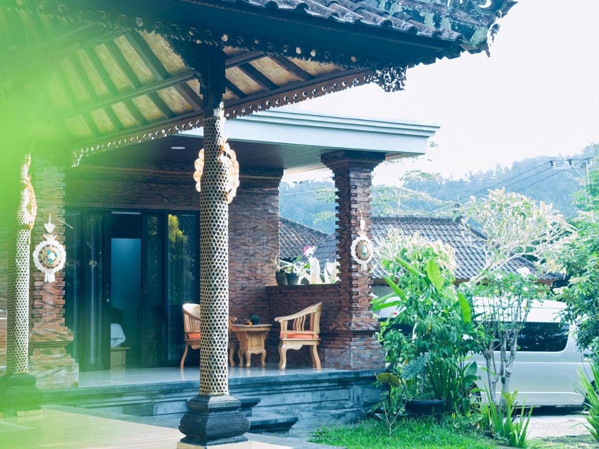 a pavilion with a table and a chair on a house at JERO Tabola 2 in Sidemen