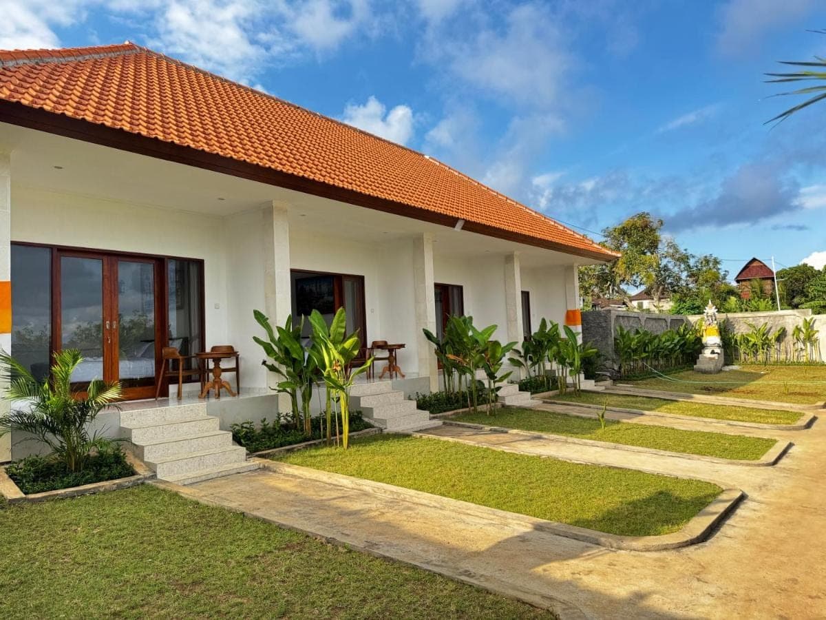 a house with a pathway leading to it at D\u00e9 Kamala Bali in Nusa Dua