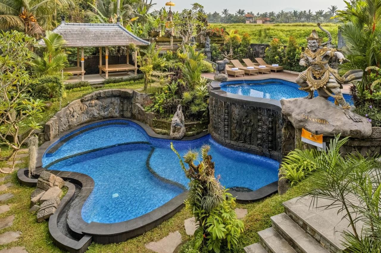 an image of a swimming pool in a resort at Gynandha Ubud Cottage in Ubud