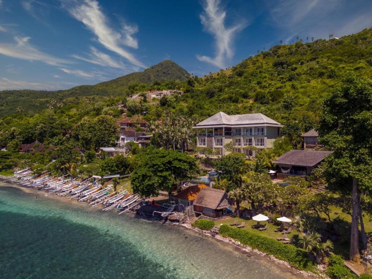 an aerial view of the resort from the water at Ibus Beach Hotel in Amed