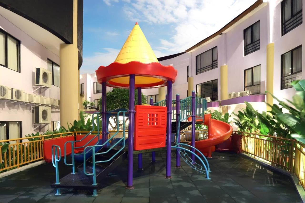 a playground with a hat on top of it at Kuta Central Park Hotel in Kuta
