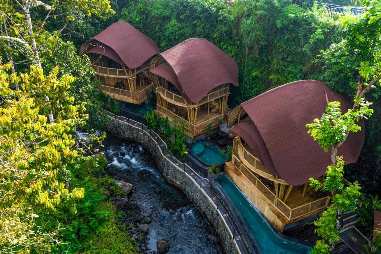 an overhead view of a water park with a waterfall at Aura Cendana Hill Sidemen by AGATA in Sidemen
