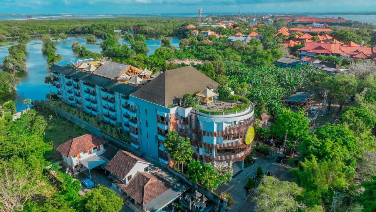 an aerial view of the resort with the river at The Nest Hotel Nusa Dua in Nusa Dua