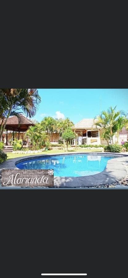 a picture of a swimming pool at a resort at Alamanda Bingin in Uluwatu