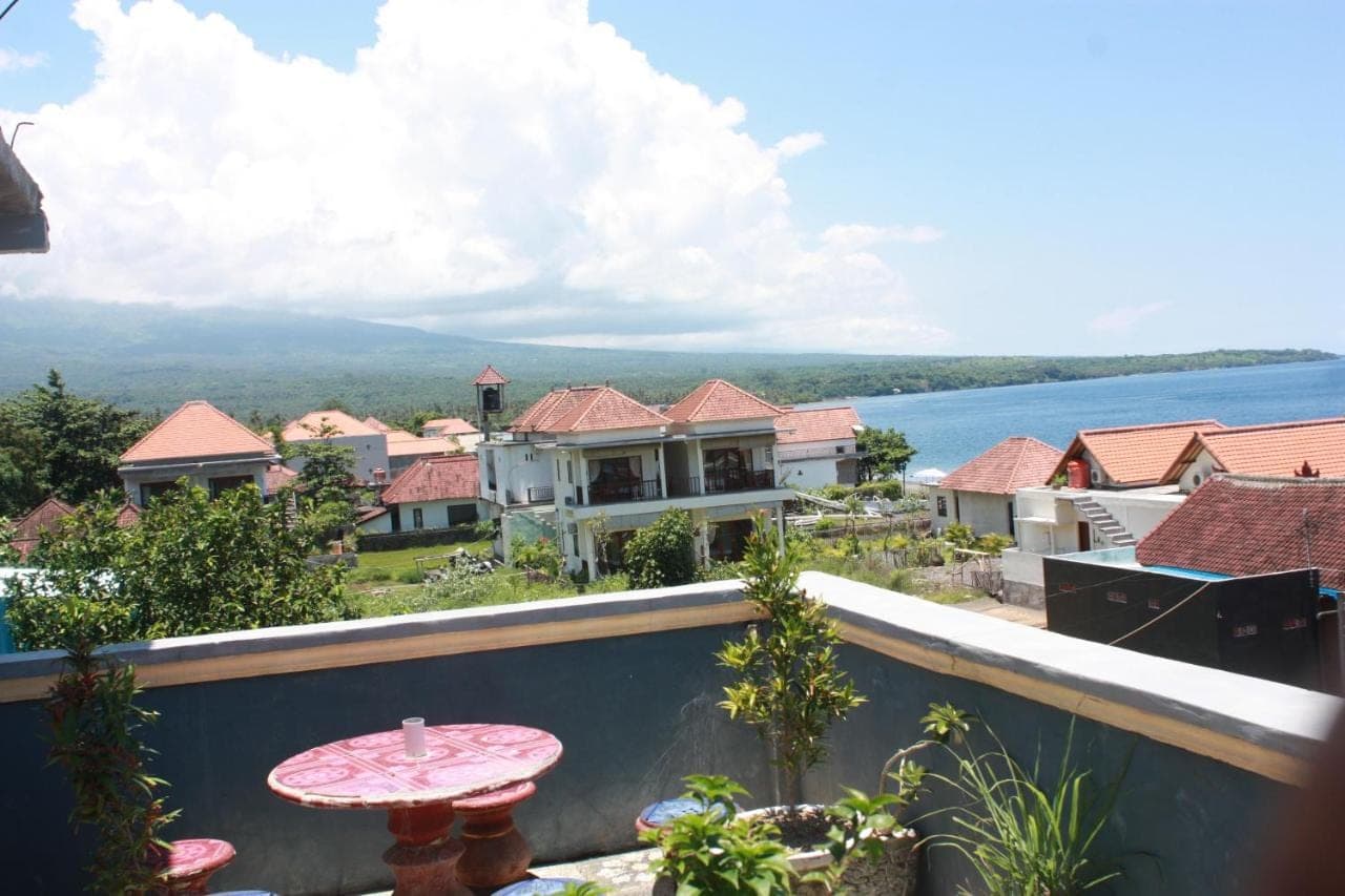 a view from the balcony of a house at Sony Home Stay in Amed