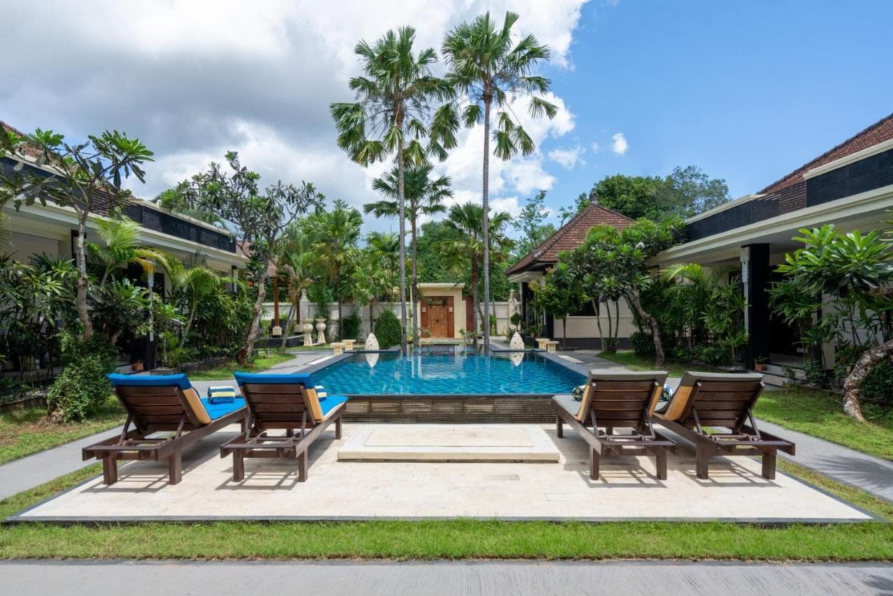 a swimming pool in the backyard of a villa at Benian Villas in Nusa Dua