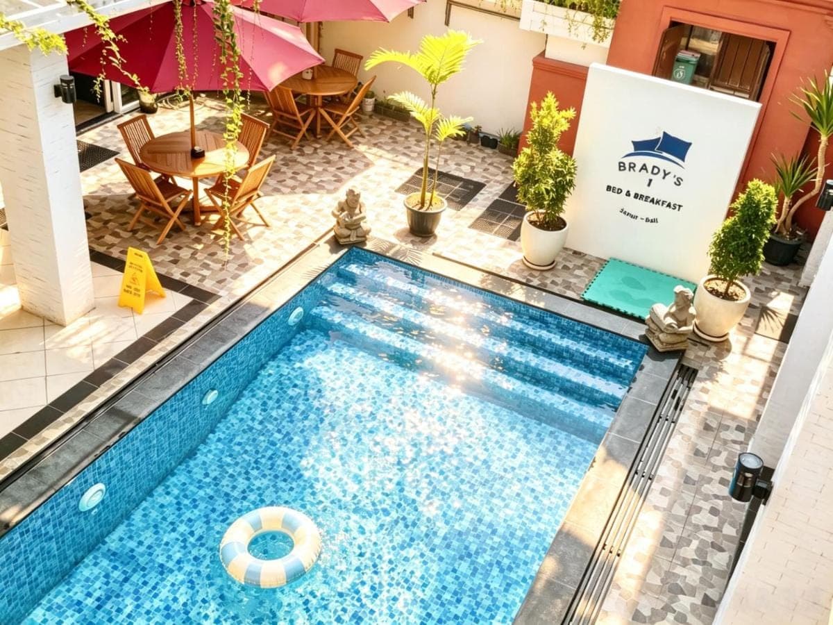 an overhead view of a swimming pool in a hotel at Brady's B&amp;B Close To Sanur Beach in Sanur