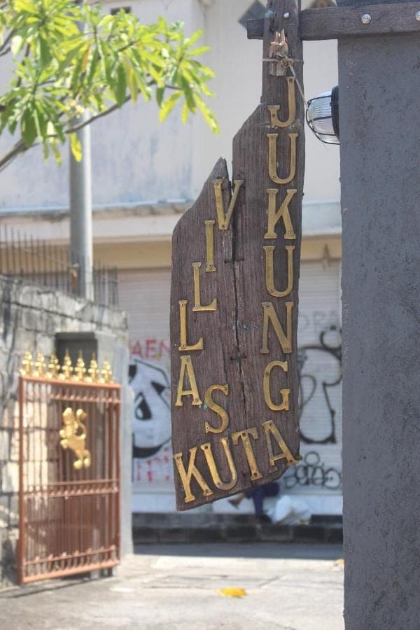 a sign that reads kirk as king of krule at Jukung Villas Kuta in Kuta