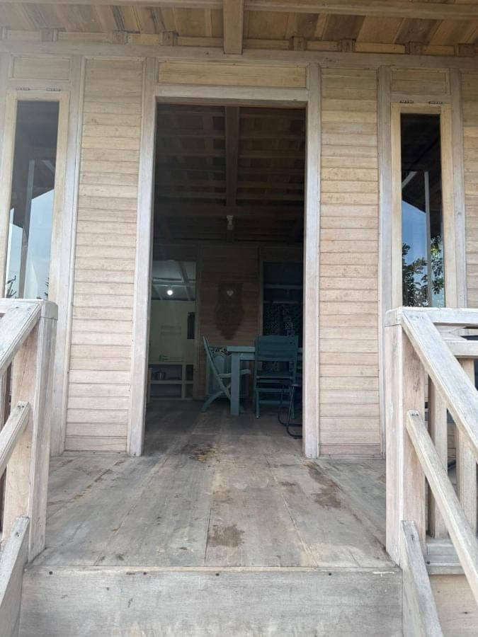 an open door of a porch of a house at Villa Anjing 2 in Nusa Dua