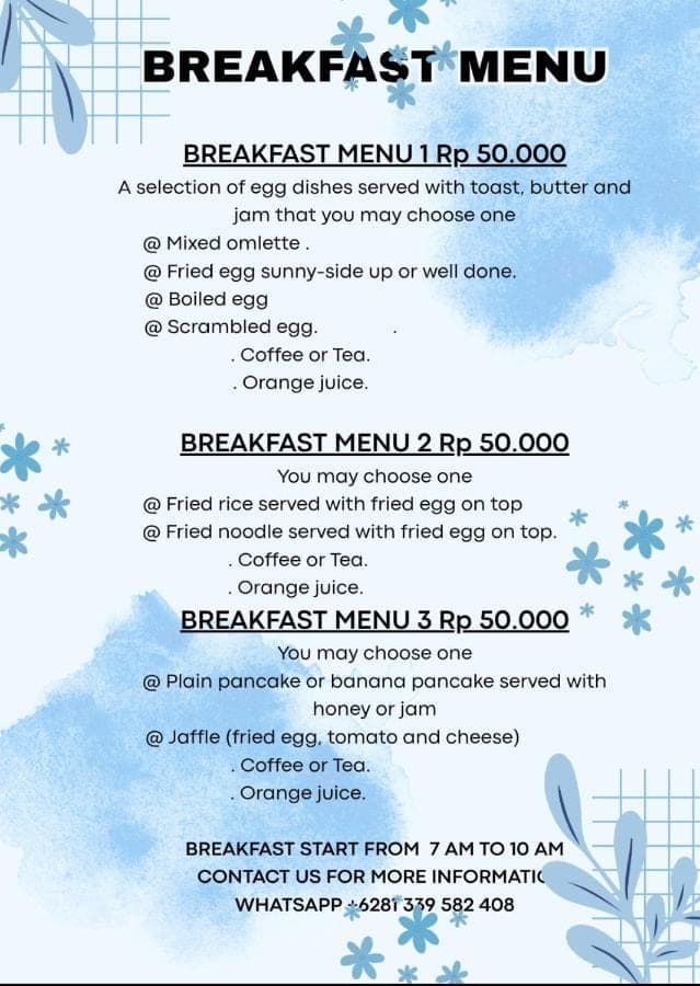 a flyer for a breakfast menu with snowflakes at Jepun Segara Guest House in Kuta