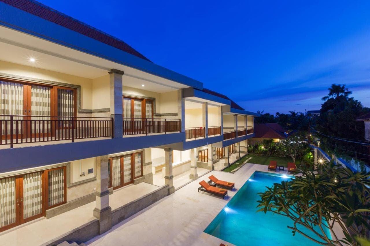 an aerial view of a house with a swimming pool at Kubu Petitenget Suite Seminyak in Seminyak
