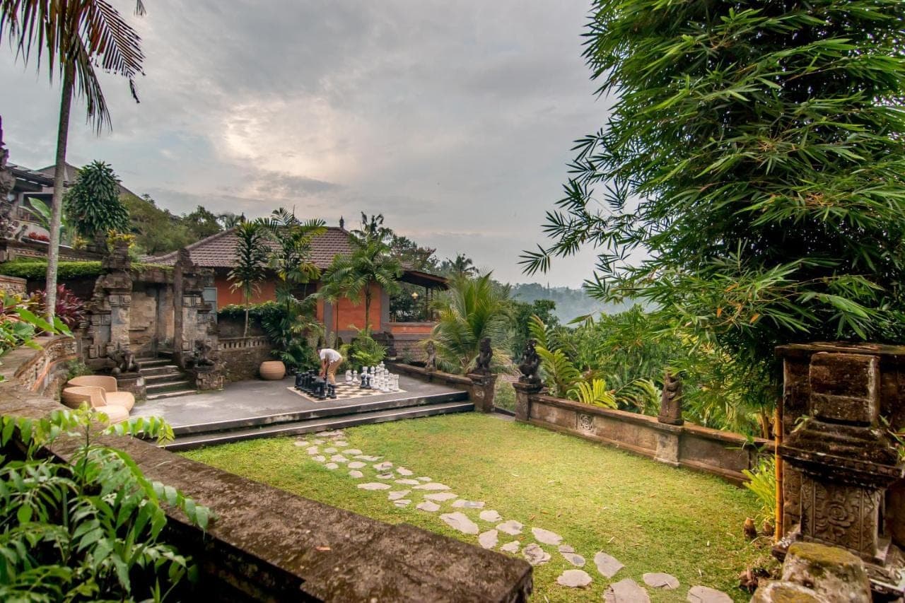a garden in front of a house at Ulun Ubud Resort &amp; Spa in Ubud
