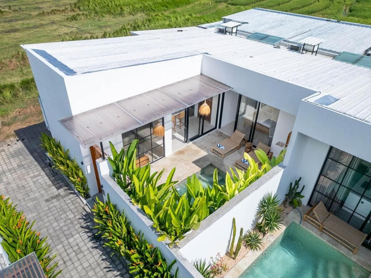 an aerial view of a house with a swimming pool at Avasa Villas - Brand New 1BR Luxury in Canggu in Canggu