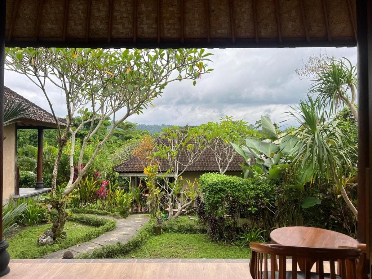 a room with a view of a garden at Giri Carik in Sidemen