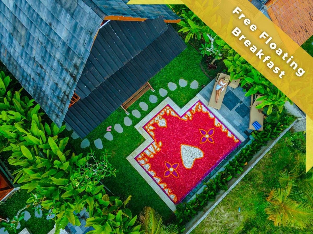 an overhead view of a garden with a flower painted on it at Romantic Wooden House with Private Pool in Ubud - Raka d'Uma in Ubud