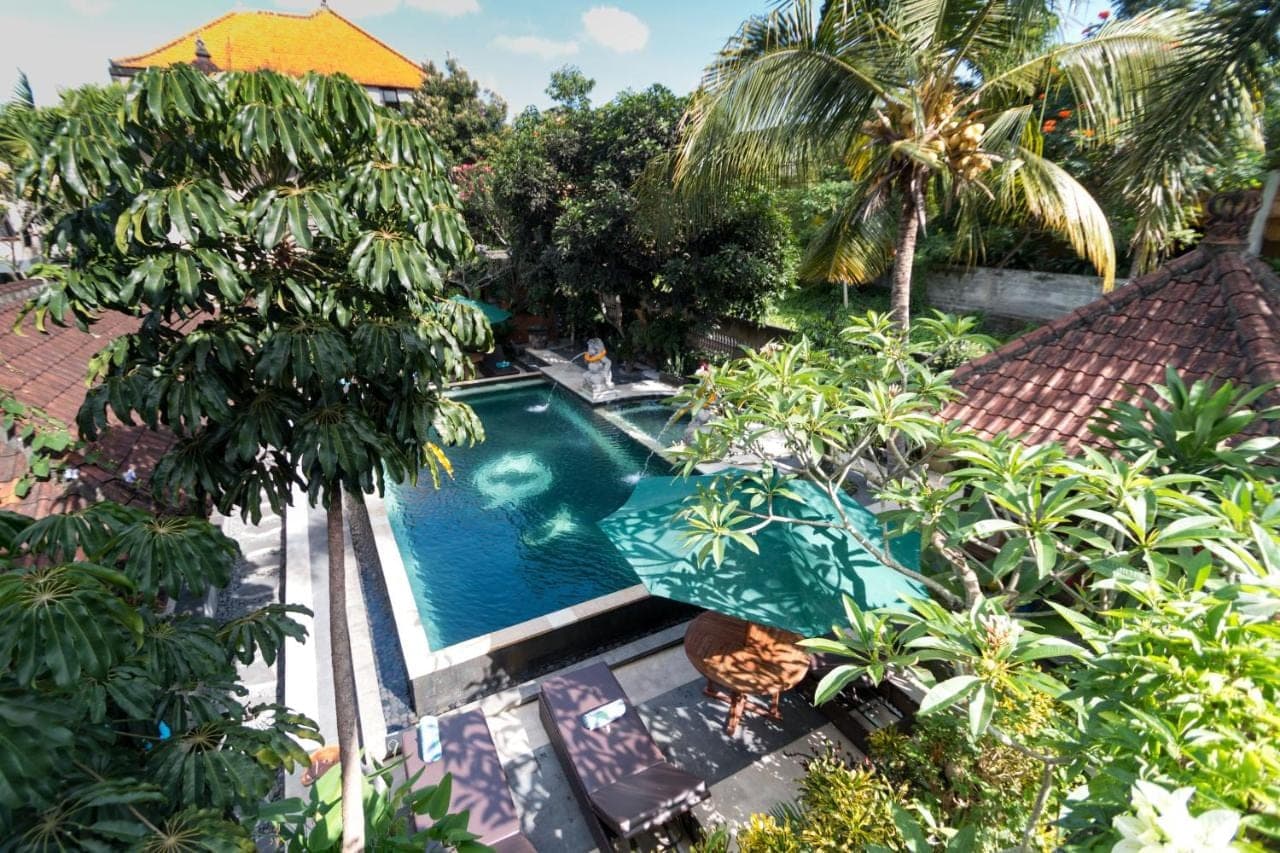 an overhead view of a swimming pool in a garden at Ubud Aura Wellness Sanctuary in Ubud