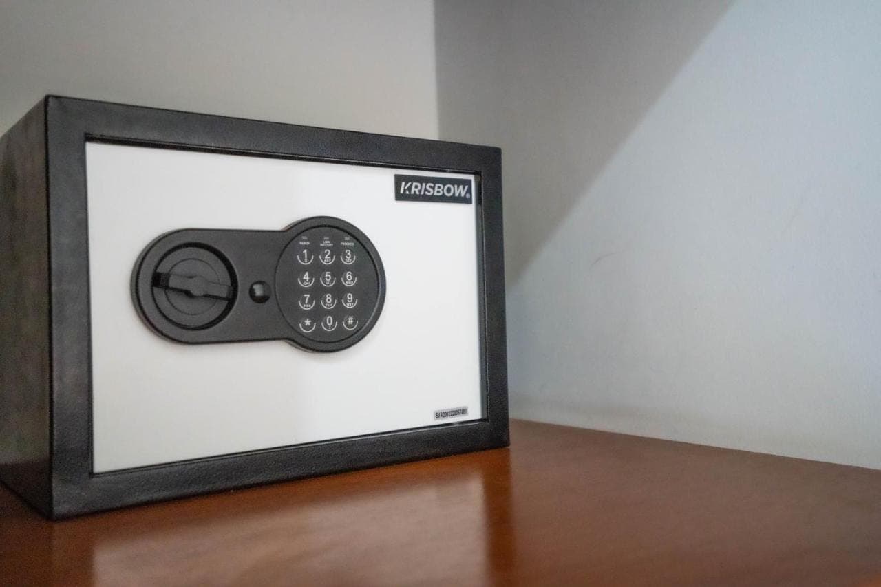 a picture of a television with a remote control at Zaara Guesthouse Uluwatu in Uluwatu