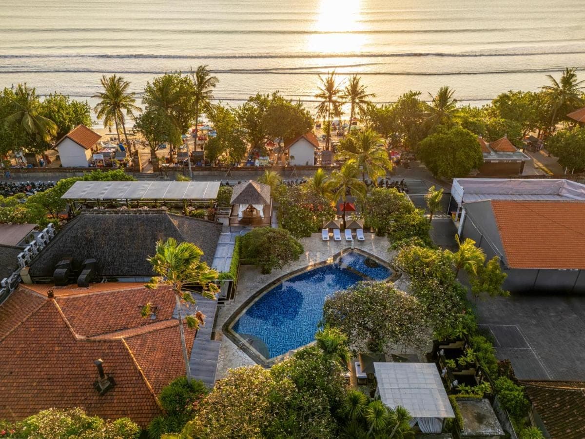 an aerial view of a resort with a swimming pool at Kuta Seaview Beach Resort in Kuta