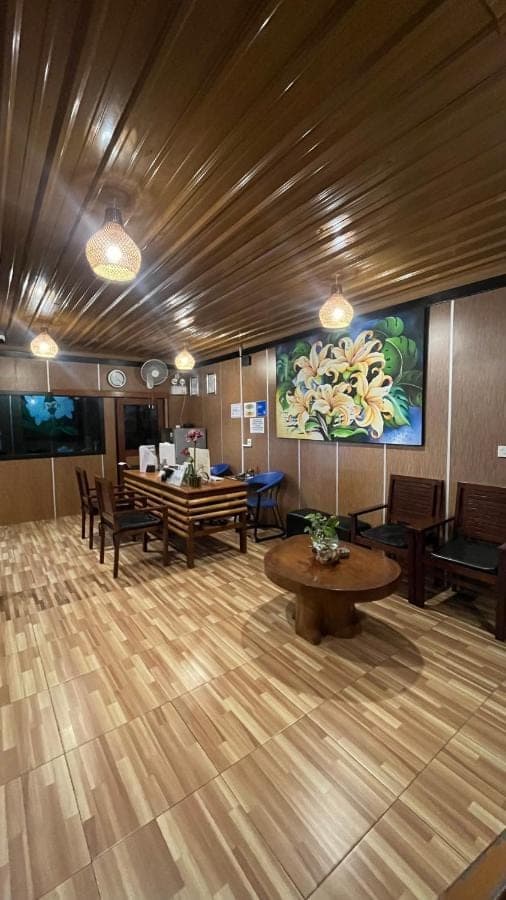 a large room with a table and a pool table at City Garden Bali Dwipa Hotel, Kuta in Kuta