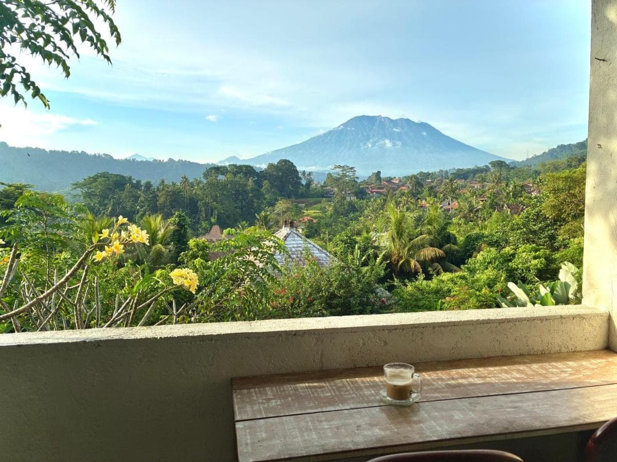 a window with a view of a mountain at Amrita Villa Sidemen in Sidemen