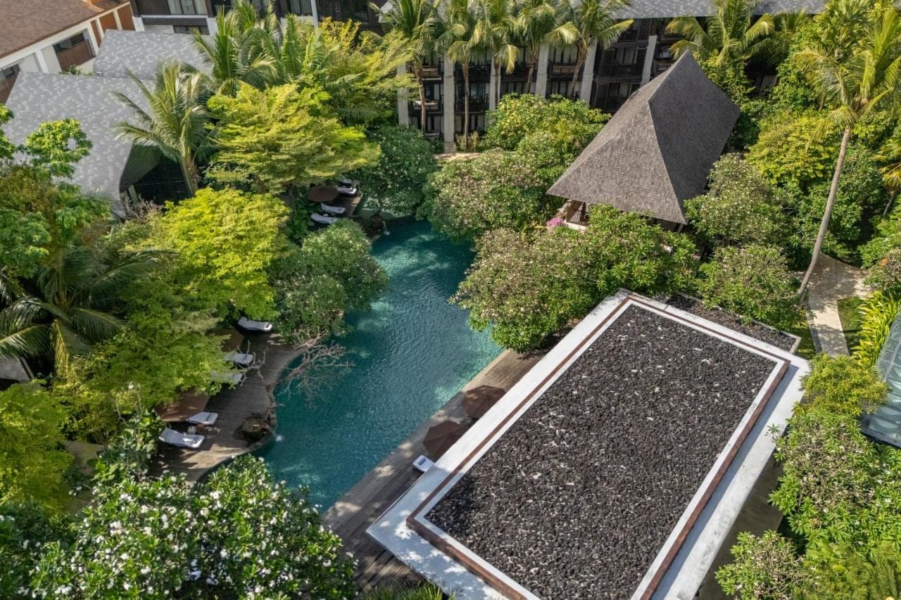 an aerial view of a river in a resort at Ramayana Suites and Resort in Kuta