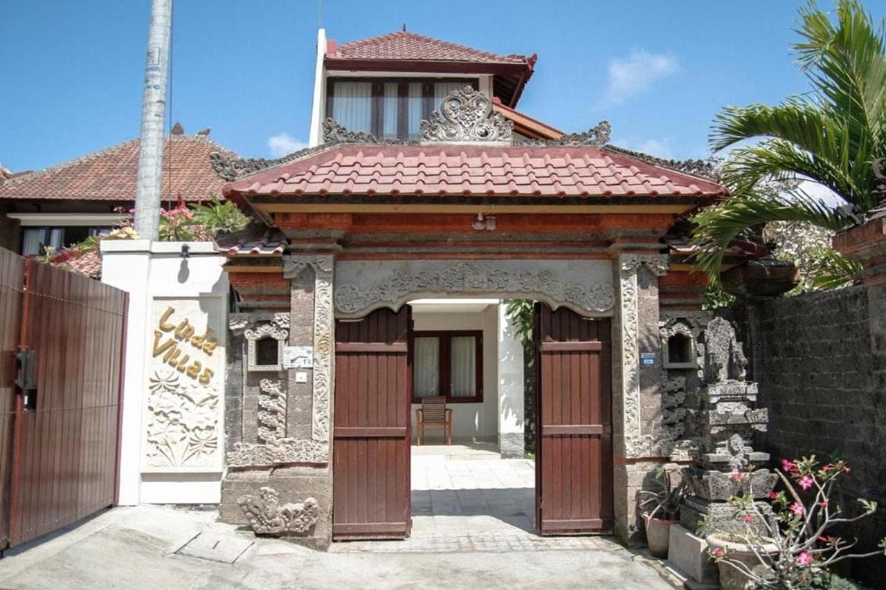 an entry to a house with a gate at Linda Villa Sanur by Linda in Sanur