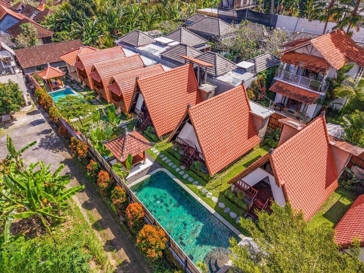 an aerial view of a house with a swimming pool at Lumbung Sari villa ubud by Dewanta Property in Ubud