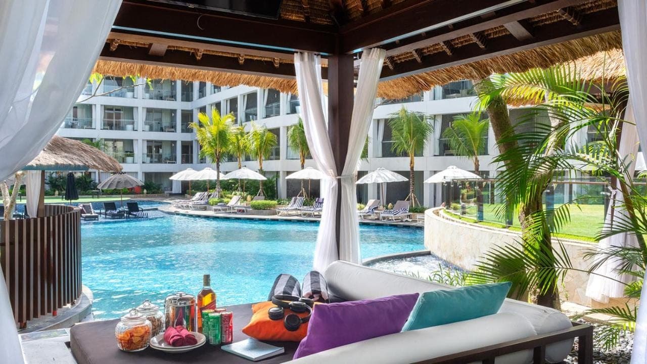 a view of the pool at the resort at The Stones Hotel - Legian Bali in Kuta