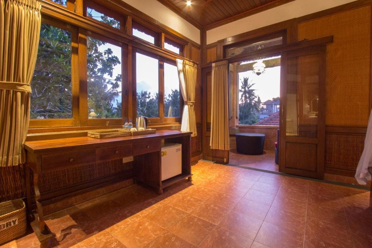 a bathroom with a sink and some windows at Ubud Terrace in Ubud