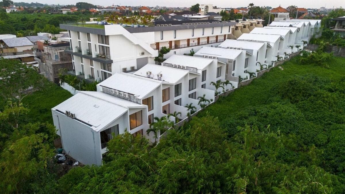 an overhead view of a row of white buildings at Pererenan Gate Brand New 1BR Retreat In Canggu in Canggu