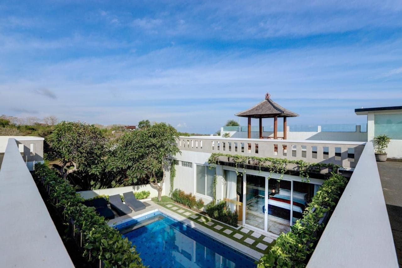 an aerial view of a building with a swimming pool at Nunamkhalu Private Villa and Spa in Nusa Dua