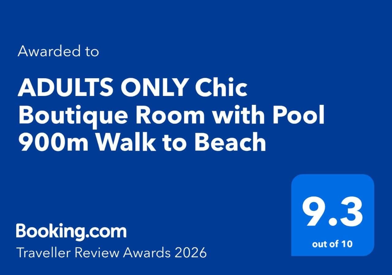 a screenshot of a phone with the textouched to adults only club bathroom room with at The Hepburn Seminyak ADULTS ONLY Chic Boutique Room with Pool 900m Walk to Beach in Seminyak