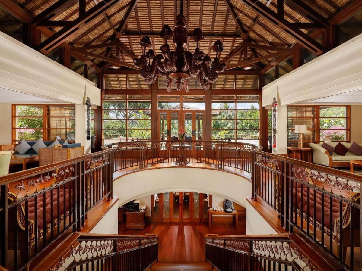 a large building with a chandelier in the middle at Nusa Dua Beach Hotel and Spa - Handwritten Collection in Nusa Dua