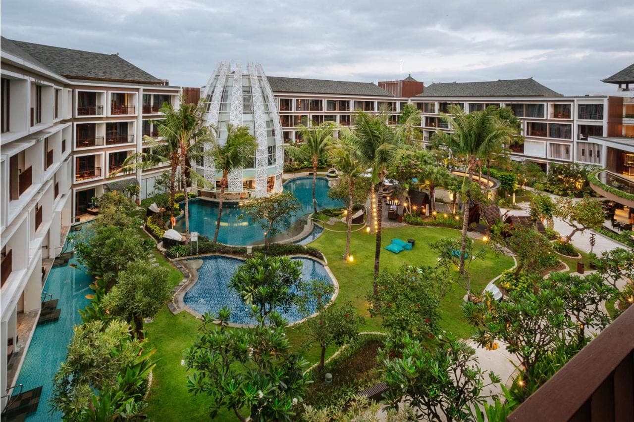 an aerial view of the courtyard of a resort at Golden Tulip Jineng Resort Bali in Kuta