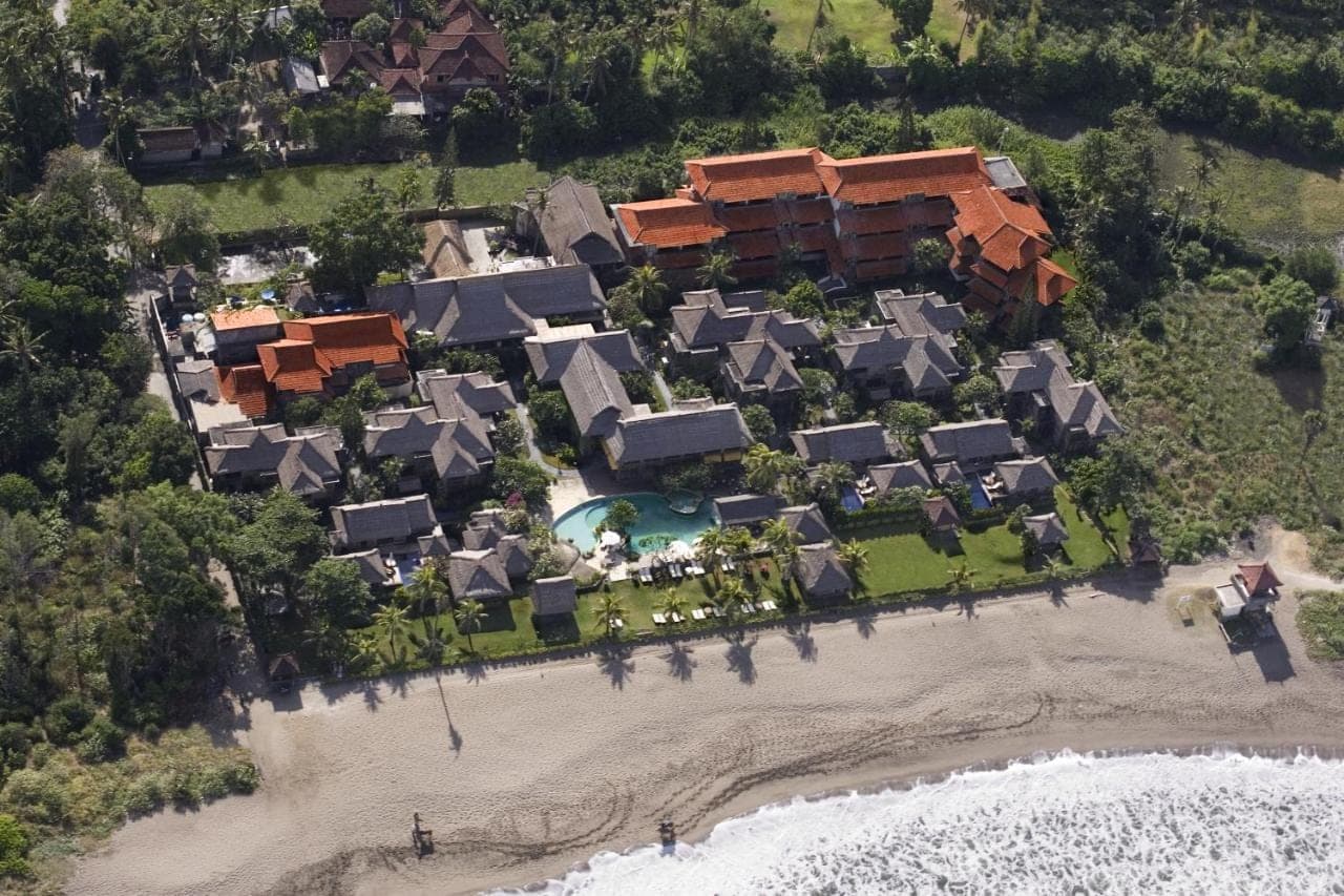 an aerial view of a resort on a beach at Grand Balisani Suites Hotel in Seminyak