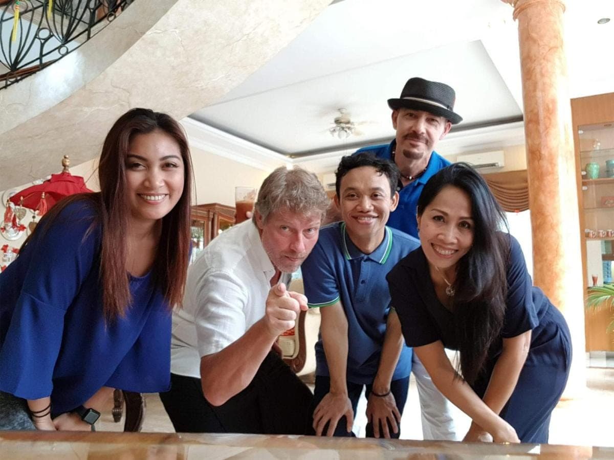 a group of people posing for a picture at Guildwood Villa Bali in Sanur
