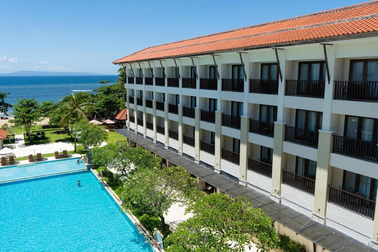 an aerial view of a hotel with a swimming pool at Bali Relaxing Resort and Spa in Nusa Dua
