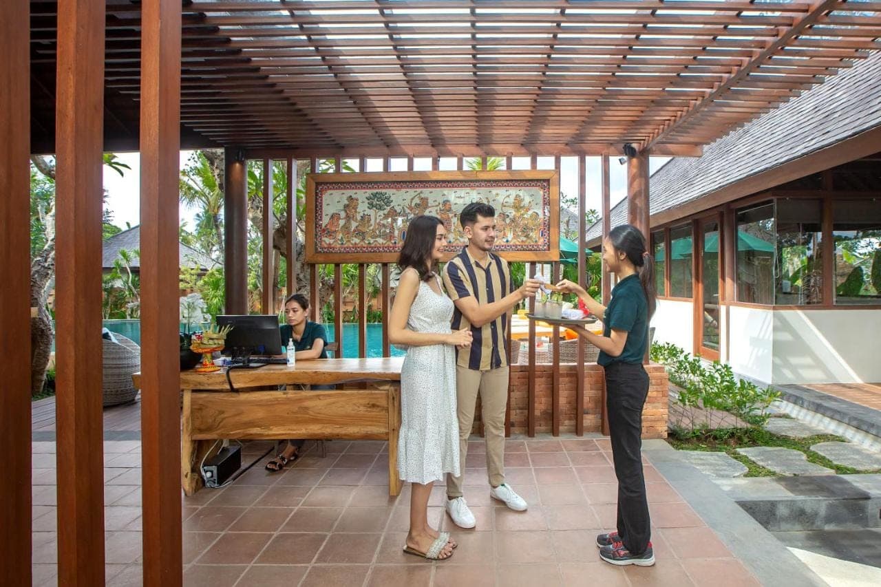 a group of people standing on a patio at Alam Wayang Ubud - CHSE Certified in Ubud