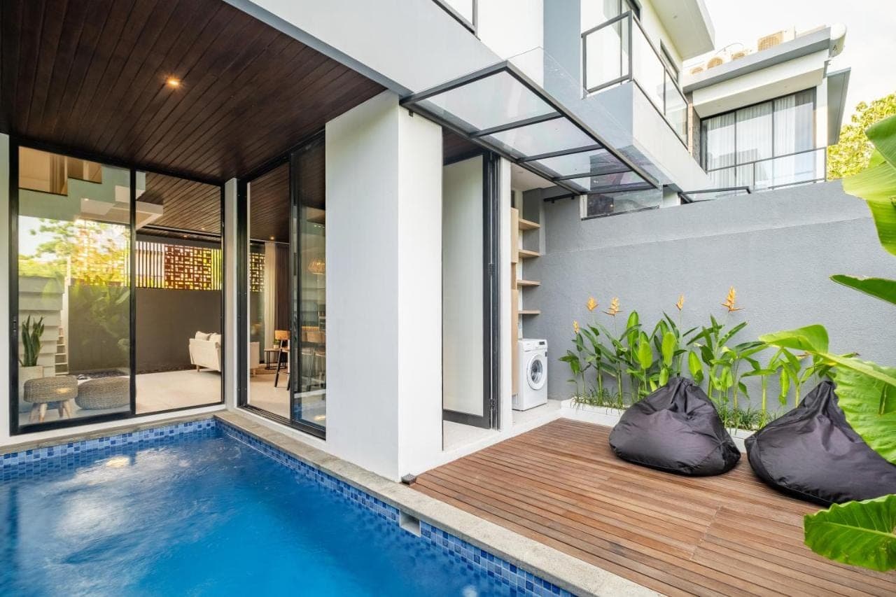 an external view of a house with a swimming pool at Private Villa Ayra 8B by OriVista 10min to Melasti Beach in Uluwatu