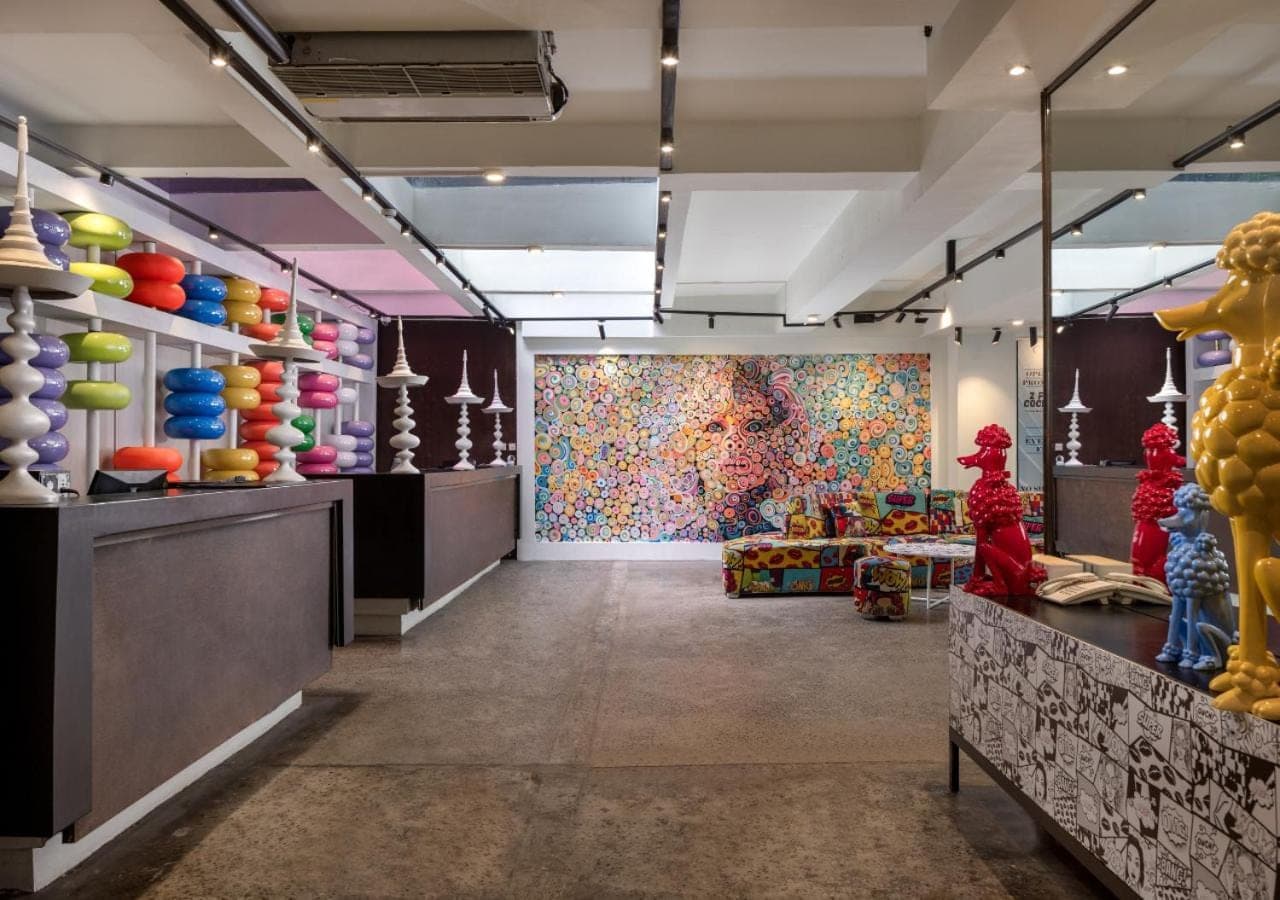 a room with a store with colorful items on the walls at Viva Dash Hotel Seminyak in Seminyak
